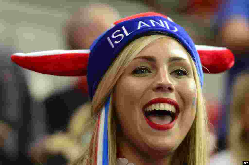 A fan of Iceland's handball team wearing a hat reacts ahead of the men's preliminary Group A handball match Iceland vs France for the London 2012 Olympics Games on August 4, 2012 at the Copper Box hall in London. 