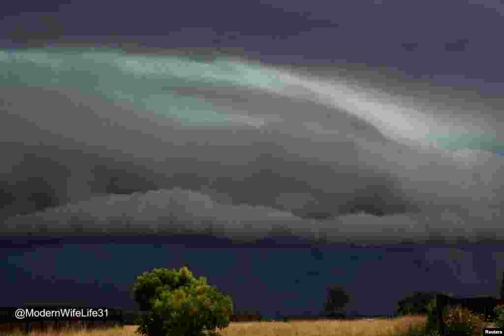 A huge cloud forms as a storm moves through Dalby, Queensland, Australia, in this picture obtained from social media. (Instagram/modernwifelife31/Handout)