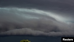 A huge cloud forms as a storm moves through Queensland, Australia, Dec. 8, 2017. (This picture is from Instagram/modernwifelife31/Handout and distributed by REUTERS.) 
