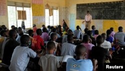 FILE: Pupils sit inside their classroom at the Sweswe Primary School in Kyegegwa District, Uganda. Taken January 11, 2022. 