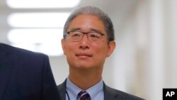 FILE - U.S. Justice Department official Bruce Ohr arrives for a closed hearing on Capitol Hill in Washington, Aug. 28, 2018.