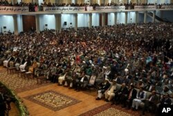 Delegates attend the last day of the Afghan Loya Jirga meeting in Kabul, Afghanistan, May 3, 2019.