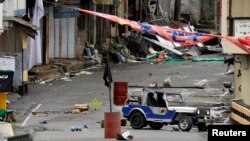 A view of the Maute group stronghold with an ISIS flag in Marawi City in southern Philippines May 29, 2017. 