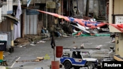 A view of the Maute group stronghold with an ISIS flag in Marawi City in southern Philippines May 29, 2017.