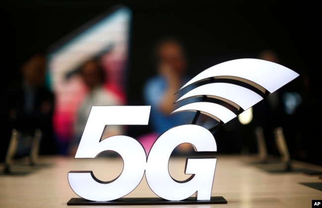 A banner of the 5G network is displayed during the Mobile World Congress wireless show, in Barcelona, Spain, Feb. 25, 2019.