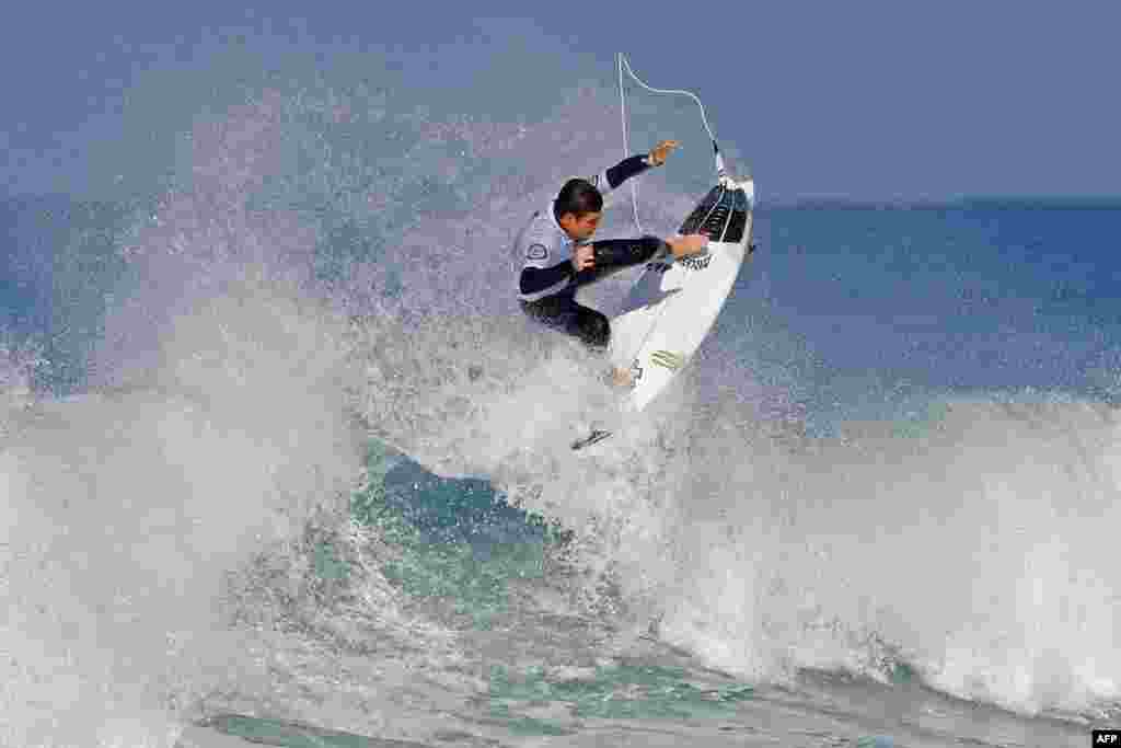 Surfer Luis Diaz of the Canary Island rides a wave during the Men's QS 3,000 qualification at the World Surf League SEAT Pro Netanya, along the Israeli coastal city of Netanya.