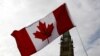 Bendera Kanada berkibar di depan Parliament Hill di Ottawa, Ontario, Kanada, 20 April 2017. (Foto: REUTERS/Chris Wattie)