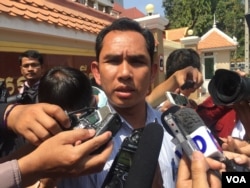 Am Sam Ath, monitoring manager at local rights group Licadho, talks to reporters after the hearing of Kem Ley’s murder at municipal court on March 1, 2017.