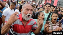 Las protestas por la escasez de alimentos y los saqueos relacionados con la crisis económica se han multiplicado en Venezuela en las últimas semanas.
