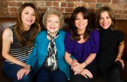 FILE - "Hot in Cleveland" co-stars, from left, Jane Leeves, Betty White, Valerie Bertinelli and Wendie Malick are pictured in New York, Nov. 27, 2012.