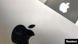 An Apple logo is seen in a store in Los Angeles, California, U.S., March 24, 2017. The company will reportedly revamp its lineup of laptops.