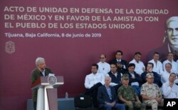 Mexican President Andres Manuel Lopez Obrador speaks during a rally in Tijuana, Mexico, June 8, 2019.