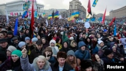 Anti-government protesters attend a rally at Independence Square in Kyiv, Jan. 12, 2014. 