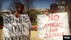 Thomas Bowie of Maryland and Jim MacDonald, a member of the New Yorkers for Immigration Control and Enforcement group, are opposed to "anything like amnesty." (Photo by Kate Woodsome)