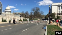 The U.S. Capitol building is shown on lockdown following a shooting incident at the building's Visitors Center, in Washington, March 28, 2016. (N. Ardanza/VOA)