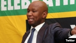 FILE - African National Congress spokesman Zizi Kodwa is seen delivering a speech in a photo taken from his Twitter feed @zizikodwa. Kodwa has accused the U.S. of trying to “undermine the democratically elected government” of South Africa.