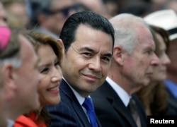 Guatemala's President Jimmy Morales (C) attends the inauguration of the Spanish Square in Guatemala City, Guatemala, Sept. 12, 2017.