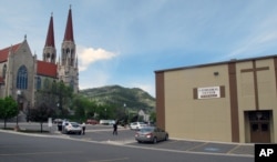 The offices of the Roman Catholic Diocese of Helena and the Cathedral of St. Helena are shown in Helena, Montana. The Diocese was forced into bankruptcy in 2014 as part of a $20 million dollar settlement plan for hundreds of abuse survivors.