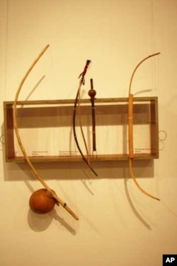 Musical bows, including a Xhosa uhadi (left), on display at an International Library of African Music exhibition in South Africa