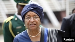 Liberia's President Ellen Johnson Sirleaf arrives for a meeting of the Economic Community of West African States (ECOWAS) in Nigeria's capital Abuja, February 16, 2012.