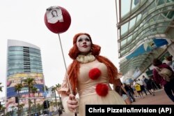 Ana Niebla, of San Diego, models her own "Princess Pennywise" outfit before Preview Night of the 2019 Comic-Con International: San Diego, Wednesday, July 17, 2019, in San Diego, Calif.