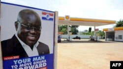 A poster of the presidential candidate of the opposition New Patriotic Party counterpart Nana Akufo-Addo is seen at the entrance of a gasoline station in Accra, October 23, 2012 