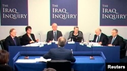 LE - A still image from video shows former British Prime Minister Tony Blair (back to camera) speaking at an inquiry into Britain's role in the Iraq War in central London, Jan. 21, 2011.