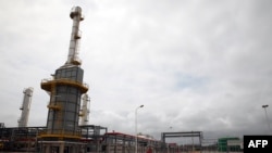 FILE: A view of the natural gas processing plant in Atuabo, outside a village on Ghana's remote west coast,. Taken Sept. 2, 2014.