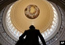 The Capitol Rotunda is seen with the statue of George Washington on Capitol Hill in Washington, Jan. 30, 2018, ahead of the State of the Union address by President Donald Trump.