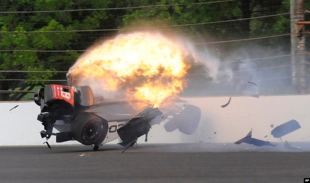 The car driven by Sebastien Bourdais, of France, bursts into flames in the second turn during qualifications for the Indianapolis 500 IndyCar auto race at Indianapolis Motor Speedway, in Indianapolis, Indiana, May 20, 2017.