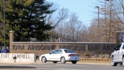 (File) United States military personal come and go through the main gate at Fort Campbell, home of the army's 101st Airbourne Divison, in Fort Campbell, Kentucky, February 22, 2007. REUTERS/John Sommers II