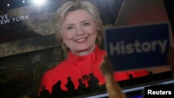 FILE - Democratic presidential nominee Hillary Clinton addresses the Democratic National Convention via a live video feed from New York during the second night at the Democratic National Convention in Philadelphia, Pennsylvania, July 26, 2016. 