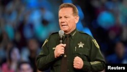 Broward County Sheriff Scott Israel speaks before the start of a CNN town hall meeting in Sunrise, Florida, Feb. 21, 2018. On Thursday, one of Israel's deputies resigned rather than face suspension for not engaging the gunman at Marjory Stoneman Douglas High School.
