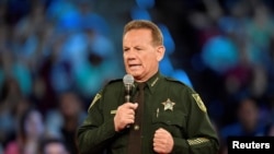 FILE - Broward County Sheriff Scott Israel speaks before the start of a CNN town hall meeting in Sunrise, Florida, Feb. 21, 2018. 