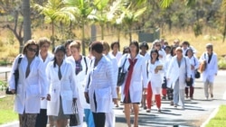 BRAZIL – Foreign physicians --mainly Cuban-- arrive at the University of Brasilia for a meeting with Brazilian Health Minister Alexandre Padilha, in Brasilia. Taken on Aug. 26, 2013.