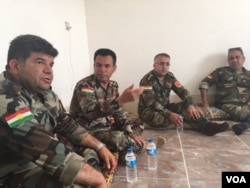 Gen. Salar Taimur (from left), Gen. Saeed Hazhar and other Peshmerga commanders sit inside a house in the newly liberated village of Zarat Khatun, June 6, 2016. (S. Behn/VOA)