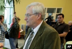FILE - Kim Schmett is pictured at an Iowa Faith and Freedom Coalition meeting in Waukee, Iowa, March 7, 2011.