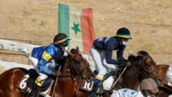 Fallou Diop competing in a weekly race by the Hippodrome Ndiaw Macodou DIOP in Thies, Senegal, February 7, 2021. (REUTERS/Zohra Bensemra)