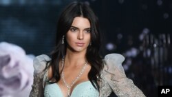 FILE - In this Nov. 10, 2015, file photo, model Kendall Jenner walks the runway during the 2015 Victoria's Secret Fashion Show at the Lexington Armory in New York.