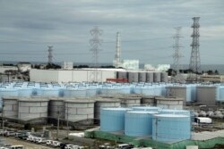 n this Oct. 12, 2017, photo, ever-growing amount of contaminated, treated but still slightly radioactive, water at the wrecked Fukushima Dai-ichi nuclear plant is stored in about 900 huge tanks