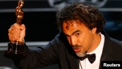 Director Alejandro Inarritu accepts the Oscar for Best Director for his film "Birdman" at the 87th Academy Awards in Hollywood, California, Feb. 22, 2015. 
