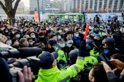 HEALTH-CORONAVIRUS/SOUTHKOREA-PROTESTS