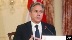 Secretary of State Antony Blinken speaks during a signing ceremony in front of the news media with Singapore's Foreign Minister Vivian Balakrishnan at the State Department, Sept. 27, 2021, in Washington. 