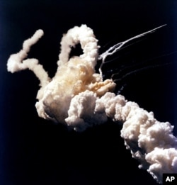 Shuttle Challenger explodes seconds after takeoff in Jan. 1986. Seven crew members perished in the explosion. (Image: NASA)