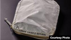 A bag carried by Apollo 11 astronauts and used to collect moon-rock samples is going up for auction. (Sotheby's)