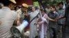 Indian Opposition Leader Gandhi Leads March Against Government