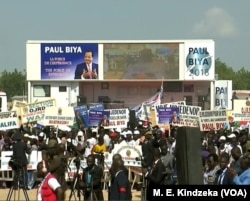 People listening to President Biya's address.