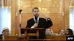 FILE - Grand Rabbi of France Haim Korsia speaks during an ecumenical ceremony at the synagogue of Sarcelles, north of Paris, July 21, 2014.