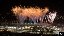Fireworks explode above the Maracana stadium during the rehearsal of the opening ceremony of the Olympic Games in Rio de Janeiro, Brazil, July 31, 2016.