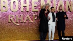 Actor Rami Malek and members of Queen Roger Taylor and Brian May attend the world premiere of the 'Bohemian Rhapsody' movie in London, Oct. 23, 2018.